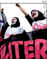 Acehnese women protest against the imposition of a civil emergency