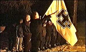 Members of far-right party saluting