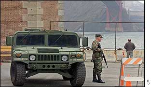 A National Guardsman stands at the ready under the Golden Gate Bridge