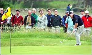 Ian Woosnam draws a crowd as he chip to the green