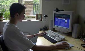 Teenager using computer