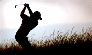 Thomas Bjorn swings at his shot 