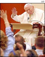 John Paul II waves to crowd