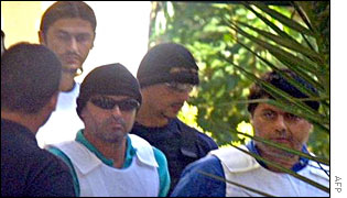 Christodoulos Xiros (R) and Vasilis Xiros(L top) arrested on suspicion of belonging to November 17.