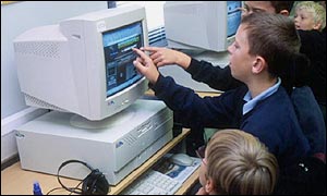 Schoolchildren using a computer