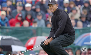 Tiger Woods misses a chance for a birdie at the fourth and stays at two under par