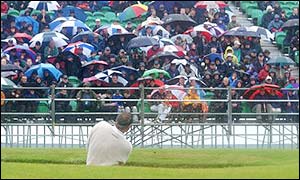 Colin Montgomerie plays out of the bunker as his Open dreams crumble