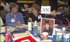 Table at conference with picture of firefighter
