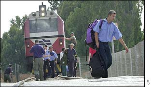 Passengers leaving the train after the blast