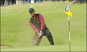 Woods keeps his score down to three over par after ten holes