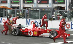Attempts to restart Rubens Barrichello's car fail and he is withdrawn