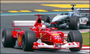 Despite being penalised, Schumacher still comes back strongly to take the lead 