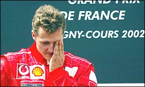 Michael Schumacher on the rostrum after winning his fifth world title