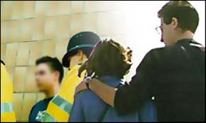 Police speak to a teenager