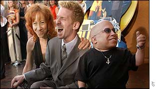 Mindy Sterling, left, with Seth Green and Verne Troyer 