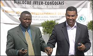 Vital Kamerhe, Congolese government representative (l) and Olivier Kamitatu from the MLC former rebels (r)