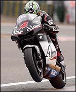 Alex Barros crashed out late in the German MotoGP race