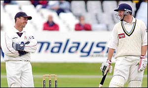 Warren Hegg shares a joke with Anthony McGrath