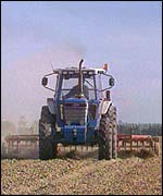 Tractor ploughing field