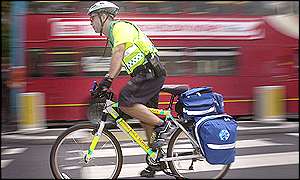 Ambulance bicycle makes its way through the busy streets of London