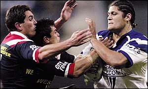 Willie Mason takes the ball up against the Sydney Roosters