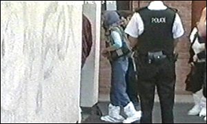 Officials enter the mosque 