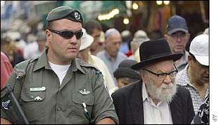 Guard in an Israeli market