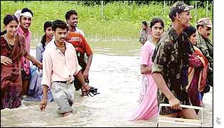Indian soldiers lead Assam villagers to safety