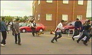 Youths protest at raid on mosque