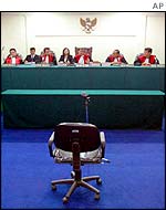 An empty defendant's chair in the Jakarta court hearing Tommy Suharto's case