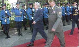 Mr Milosevic reviewing troops