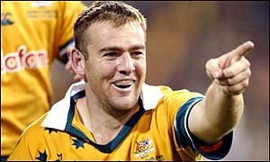 Latham celebrates his try