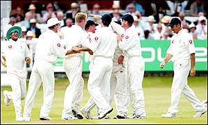 Craig White follows his 53 in England's first innings with the vital wicket of Tendulkar in India's reply