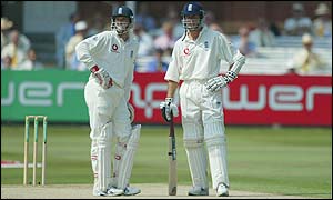 John Crawley and Michael Vaughan await the third umpire's verdict