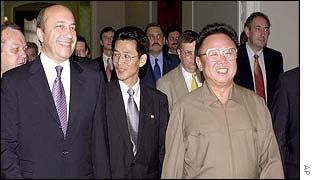 Russian Foreign Minister Igor Ivanov walks with North Korean President Kim Jong-il
