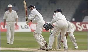 India's Ajit Agarkar works the ball through the leg-side