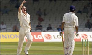 England bowler Simon Jones celebrates the wicket of VVS Laxman