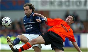 Charlie Miller in action in the Dundee derby
