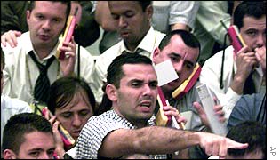 Traders work in the dollar pit at the BM&F futures and commodities market in Sao Paulo, Brazil on Monday July 29, 2002.