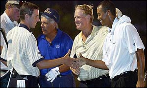 Sergio Garcia congratulates Jack Nicklaus and Tiger Woods