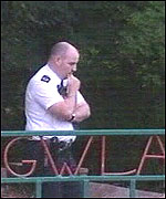 Police officer at scene of death