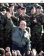 President George Bush with US troops leaving for Afghanistan last year