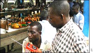 Kinshasa residents listening to the radio