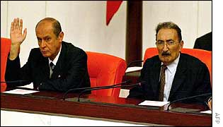 Opposition grouping leader Devlet Bahceli (left), with Prime Minister Bulent Ecevit in parliament 