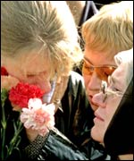 Family members of a seaman killed, when the nuclear submarine Kursk sank in the Barents Sea