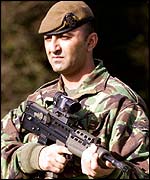 Soldier with SA80 rifle