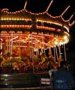 A fairground ride on Bournemouth pier at night