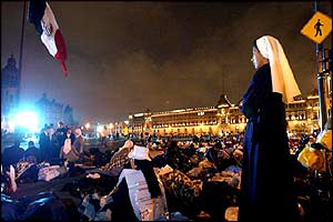 A nun outside the Basilica of Guadalupe, where the canonisation Mass was held