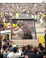 Pope John Paul II rides in the popemobile upon his arrival at the Basilica of Guadalupe