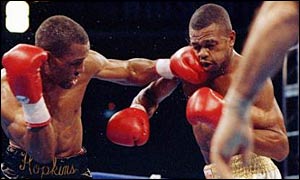 Bernard Hopkins (left) catches Roy Jones Jnr with a left hook